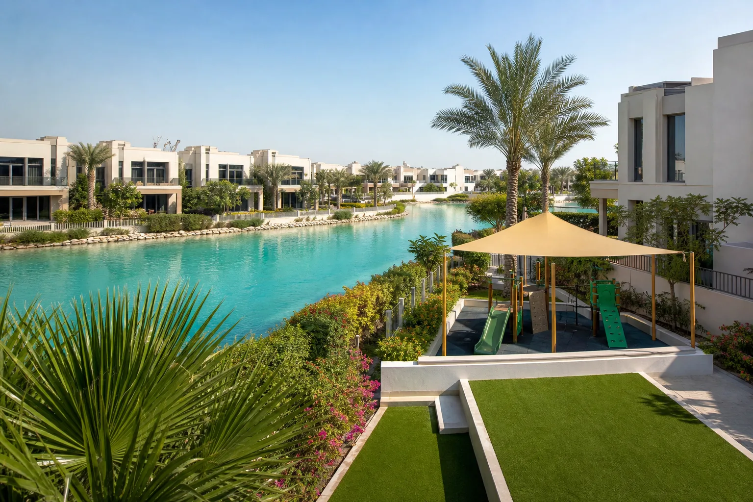 Villas familiales avec jardins et lagon artificiel dans une communauté résidentielle de Dubaï