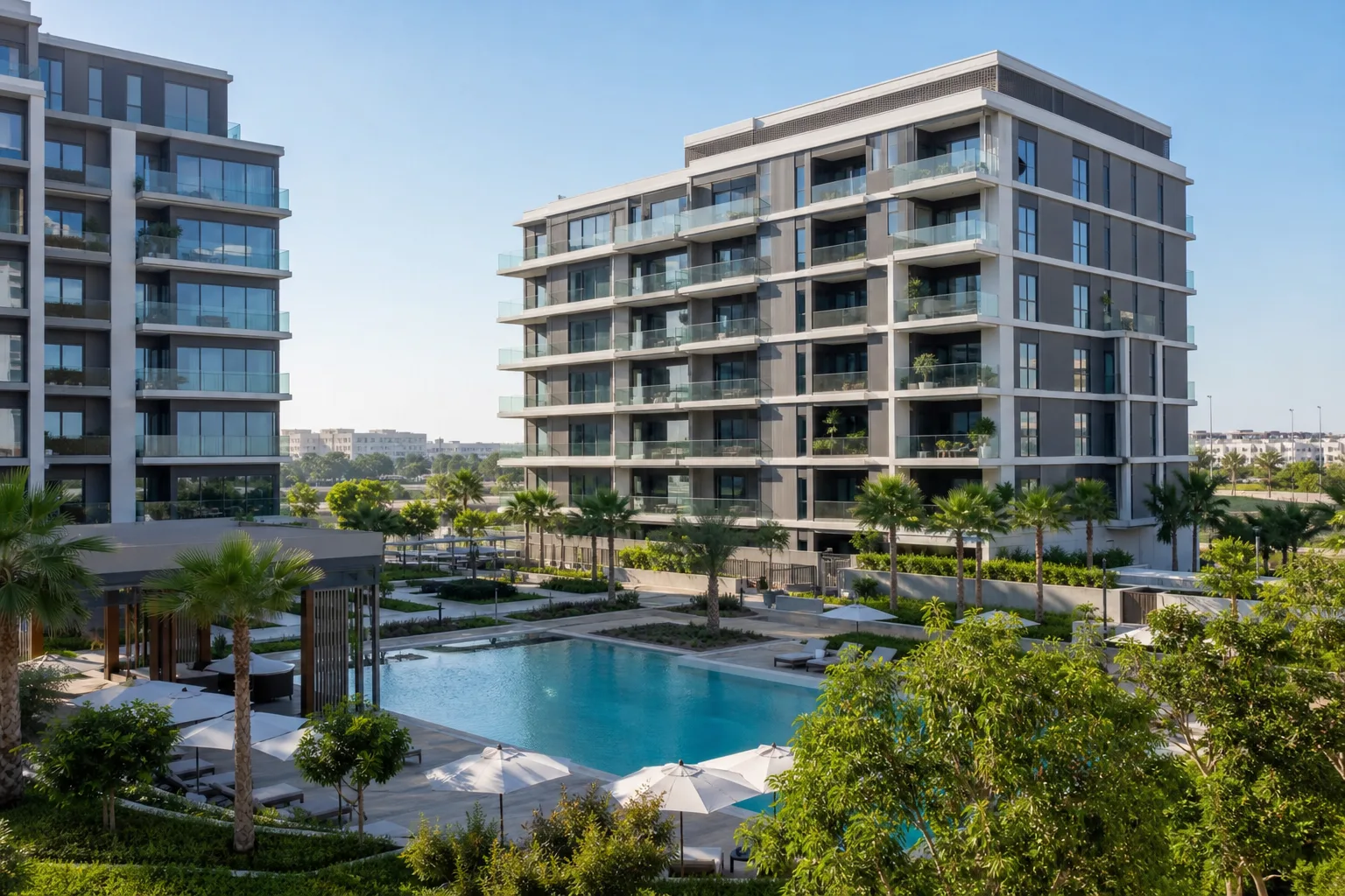 Render realista de edificios residenciales nuevos con balcones ajardinados alrededor de una piscina comunitaria en Dubai Hills Estate